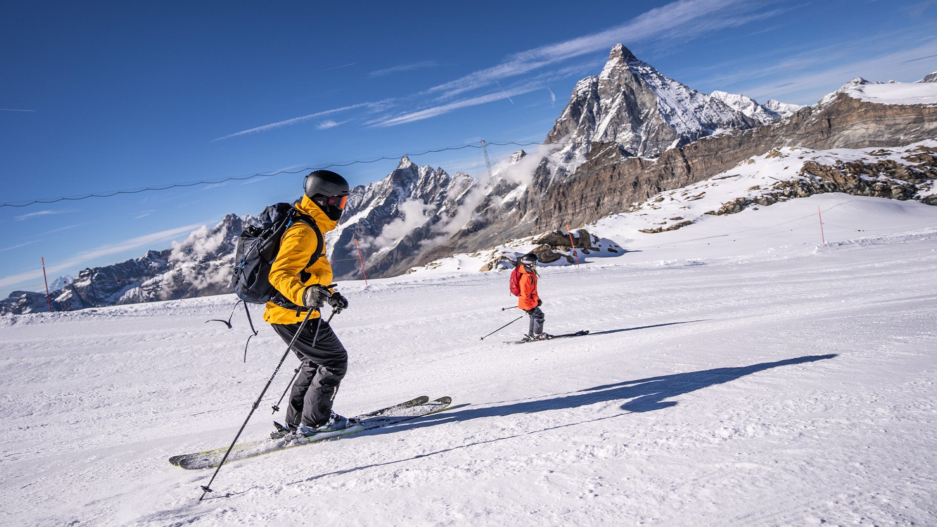 Mand og kvinde på ski iført Matterhorn Skaljakke